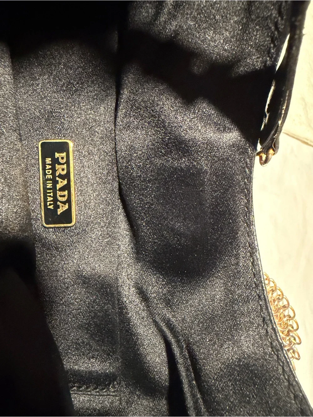 Prada Black Leather Hobo with Gold Chain Accent and dust bag .